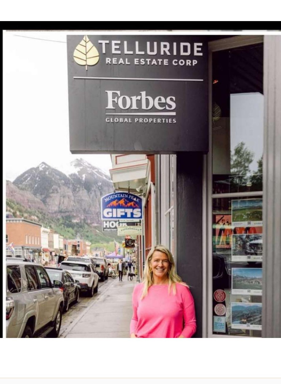 Jill Landman Alfond outside Telluride Real Estate Corp Forbes Global Properties office on Colorado Avenue, Telluride